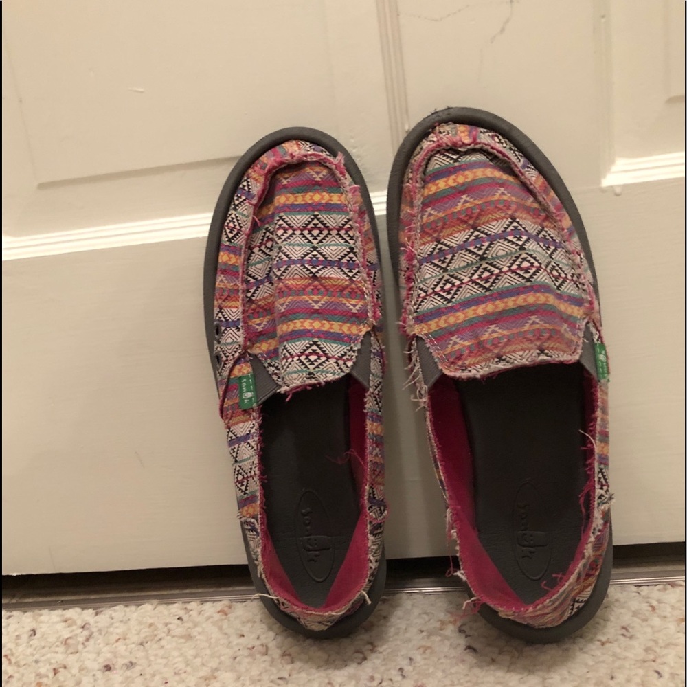Sanuk slip-ons.